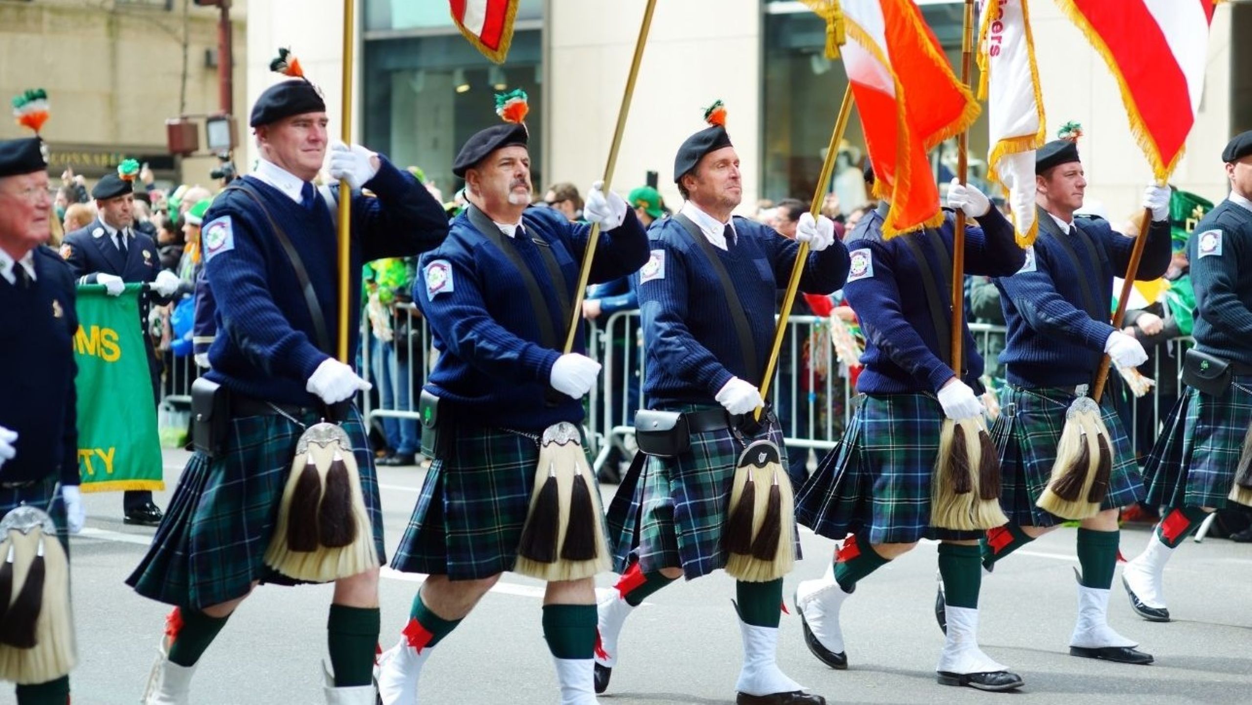 NYC St. Patrick's Day parade guide showing crowds along Fifth Avenue celebrating Irish heritage event