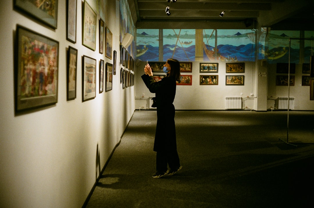 A visitor examines artifacts inside one of New York City's hidden museums in a quiet Lower East Side gallery