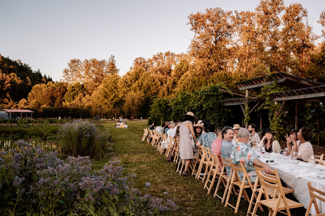 people enjoying outdoor dining at a lush restaurant garden terrace in New York City
