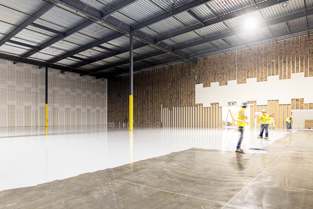 A small investor reviews documents inside a New York City storage units facility, assessing occupancy and returns data.