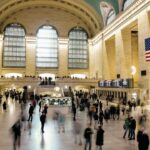 Traveler boards a train for day trips from NYC