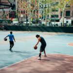 Players in a pickup basketball game at the West 4th Street cage